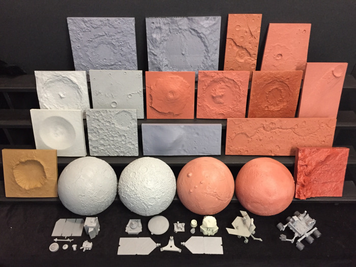 Partial collection of full size terrain models from Earth, the Moon, and Mars.  Also includes 4 different spacecraft kits.